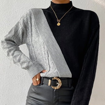 Black ribbed knit turtleneck sweater featuring chunky contrast gray sleeves, displayed in an XL size.