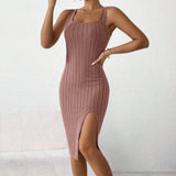 Black ribbed midi dress with a square neck, side slit, and form-fitting design, shown in rose color, size XL.