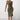 
A woman wearing a form-fitting green ribbed midi dress with a square neck and side slit, emphasizing the shoulders and arms.
