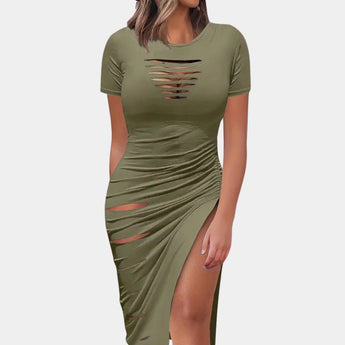 
A green ruched midi dress in XL size, featuring a sheath silhouette with short sleeves and a fitted waist, showcasing an elegant and versatile design suitable for various occasions.