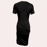 Black ruched midi dress with short sleeves, featuring an elegant and versatile sheath design.