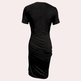 Black ruched midi dress with short sleeves, featuring an elegant and versatile sheath design.