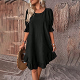 A black ruffle dress designed for women, featuring short sleeves and knee-length cut. The dress is one-piece with attention to the shoulder and waist fit, suitable for casual wear. Shown in size 3XL.