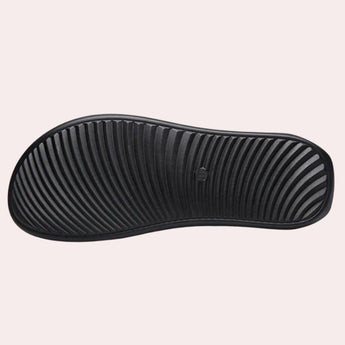 
A glossy black satin headband designed as a wide, elegant hair accessory with a smooth texture and simple, sophisticated style.