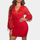 
Alt Text: Woman wearing a red XL black sequin party dress featuring a sheer beaded blouse and an open back, showcasing a sophisticated and elegant design.
