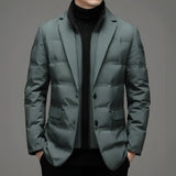Black slim fit double-breasted blazer for men, featuring a structured silhouette with a notched collar, long sleeves, and grey accents, styled over a dress shirt for a formal, modern appearance.