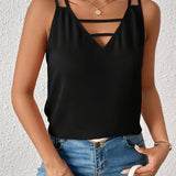 A woman wearing a Black Strappy V-Neck Tank Top in size XL, showcasing lightweight summer streetwear blouse.
