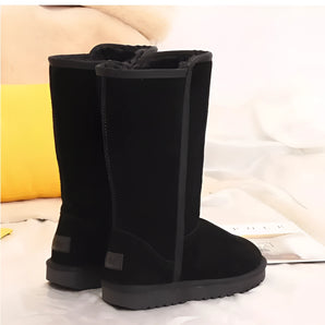 Women's Black Suede Fur-Lined Tall Winter Boots for Thermal Luxury, shown on human legs, designed for comfort and warmth, suitable for snow and rain.
