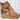 Brown Suede Wedge Sandals with High Platform and Buckle Heel, shown on a human leg, featuring a boho chic design.