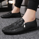 Black textured leather slip-on loafers with a zipper for men, shown in size 44, highlighting their stylish and sleek design.