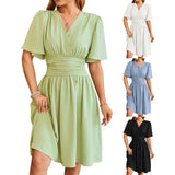 Black V-Neck Knee-Length Casual Summer Dress with Pockets featuring short sleeves and a flattering waistline.