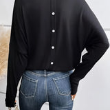 Black V-neck long sleeve blouse with a casual lightweight design for women, suitable for pairing with jeans or other casual wear.