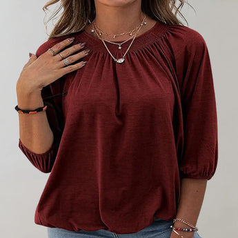 Black velvet blouse with a gathered neckline, shown in Bordeaux color, displayed on a model wearing size 2XL, highlighting the loose fit and long sleeves.