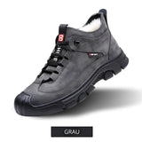 Gray waterproof hiking sneakers with durable, non-slip soles and breathable design, suitable for outdoor activities.