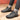Black waterproof hiking sneakers featuring durable, non-slip soles and breathable material, designed for sportswear and walking activities; shown in a grey and electric blue color scheme.
