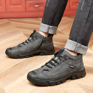 Black waterproof hiking sneakers featuring durable, non-slip soles and breathable material, designed for sportswear and walking activities; shown in a grey and electric blue color scheme.