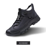 Black waterproof hiking sneakers designed for outdoor activities, featuring a breathable and durable construction with a non-slip sole, shown in size 48.