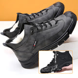 Black waterproof hiking sneakers designed for durability and non-slip performance, featuring a breathable mesh upper, synthetic rubber sole, and an overall sporty, outdoor-ready appearance.