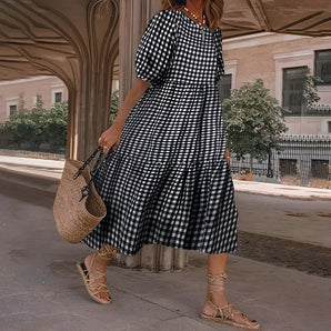Black and white gingham midi dress with puff sleeves in a classic checkered pattern, displayed in size 5XL.