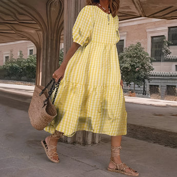 Black & white gingham midi dress with puff sleeves, featuring a classic checkered pattern, shown in a yellow color variant, size 5XL.