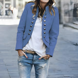 Black women's double-breasted military jacket with silver buttons, styled for autumn fashion, shown in sky blue color, size 5XL. Model pairs it with jeans and a white dress shirt.