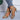 Black women's slingback stiletto peep-toe heels in a leopard print design, featuring a formal sandal style with a high heel. The image focuses on the elegant and stylish footwear, suitable for dressy occasions.