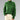 
A green 2XL women's wool cable knit turtleneck sweater, featuring a textured pattern and long sleeves, suitable for fall fashion.