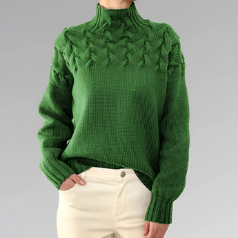 
A green 2XL women's wool cable knit turtleneck sweater, featuring a textured pattern and long sleeves, suitable for fall fashion.