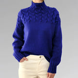 Women's royal blue turtleneck sweater in a cable knit design, suitable for fall fashion. The sweater is woolen, featuring long sleeves and a cozy fit for a 2XL size.