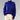 Women's royal blue turtleneck sweater in a cable knit design, suitable for fall fashion. The sweater is woolen, featuring long sleeves and a cozy fit for a 2XL size.