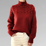 
Image of a women's red cable knit turtleneck sweater in size 2XL, featuring long sleeves and a textured pattern, designed for fall fashion.