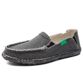 Lightweight black woven loafers in a slip-on style, featuring a breathable design and a subtle pattern. The shoes are showcased in a gray color variant and are size 12, suitable for outdoor walking and casual settings.