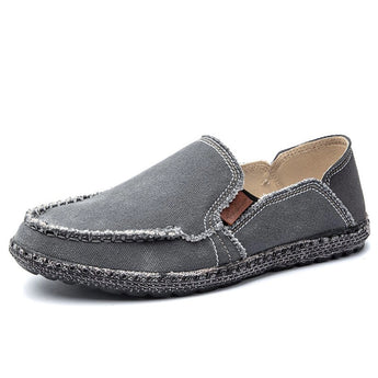 Gray woven loafers designed as breathable and lightweight slip-on shoes, suitable for outdoor use, featuring a fashionable and modern style.