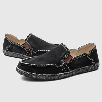 Black woven loafers designed as breathable, lightweight slip-on shoes ideal for walking and outdoor use, featuring a stylish fashion design.