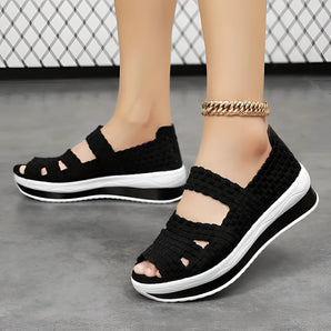 Black woven women's open-toe platform sandals featuring a lightweight and breathable design, displayed in size 42.