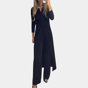 Black wrap V-neck midi dress with long sleeves and an asymmetrical design, showcasing a flattering silhouette in size 3XL.