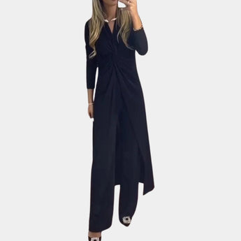 Black wrap V-neck midi dress with long sleeves and an asymmetrical design, showcasing a flattering silhouette in size 3XL.