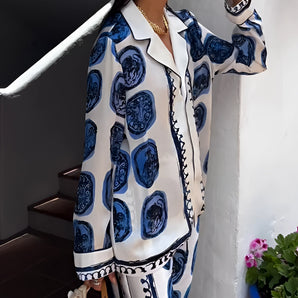 Blue Agate Satin Pajama Set featuring a luxurious design, with a long-sleeved top in a soft blue satin fabric and a matching pair of pants, offering a comfortable and stylish sleepwear option.