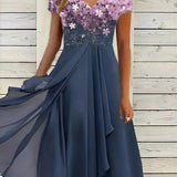 Blue and black floral sequin V-neck knee-length cocktail dress with blue rose pattern, displayed on a mannequin, highlighting the dress's elegant design and shimmering sequin detailing.