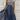 Blue and black floral sequin V-neck knee-length cocktail dress in a blue silver colorway, displayed on a mannequin showcasing the dress's intricate design and elegant style suitable for formal occasions.