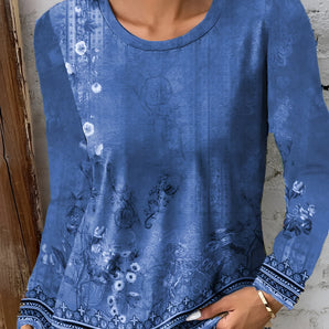 Blue Bohemian floral embroidered long sleeve blouse in size 2XL, featuring intricate floral patterns on the sleeves and body, with a relaxed boho chic style and a comfortable fit.