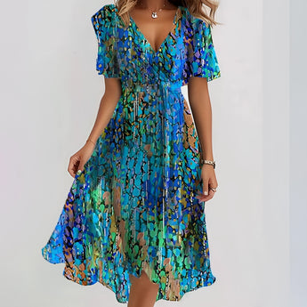 Blue green V-neck midi dress with flutter sleeves and asymmetrical hem, shown in XXL size.