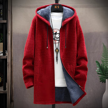 Blue men's urban style thermal fleece jacket designed for winter, featuring a zip-up front, long sleeves, and a high collar. The jacket is displayed on a clothes hanger, highlighting its contemporary fashion design and warm fleece material.