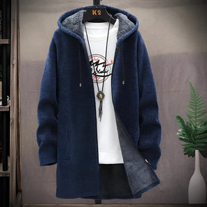 Blue men's urban style thermal fleece jacket hanging on a clothes hanger, featuring a zip-up front, long sleeves, and a collar, suitable for winter wear.