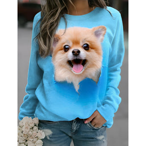 Blue Pomeranian sweatshirt featuring a realistic print of a Pomeranian dog, designed for pet lovers. The sweatshirt is in a vibrant azure color and is available in size 5XL, showcasing detailed textile work that highlights the breed's distinctive fluffy appearance.