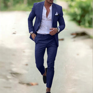 Dark blue slim fit men's suit in 3XL, featuring a modern tailored business casual blazer with dress shirt, sleeves, and collar details.