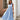 Blue striped sleeveless midi dress with a V-neck and button-front design, suitable for casual daytime wear.