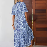 Blue and white V-neck boho maxi dress with short sleeves and a fitted waist, perfect for summer beachwear.