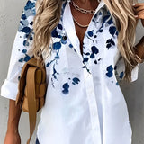 Blue and white floral blouse for women, featuring a lightweight design ideal for summer, with a collar and short sleeves, shown in size 5XL.