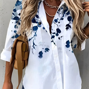 Blue and white floral blouse for women, featuring a lightweight design ideal for summer, with a collar and short sleeves, shown in size 5XL.